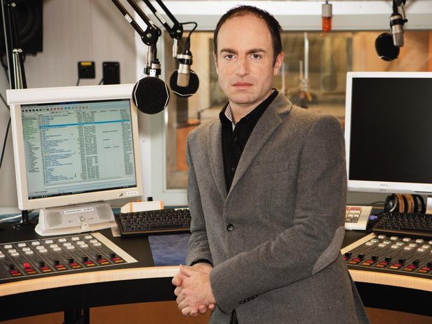 Radio host Benjamin Herzog talks to ...